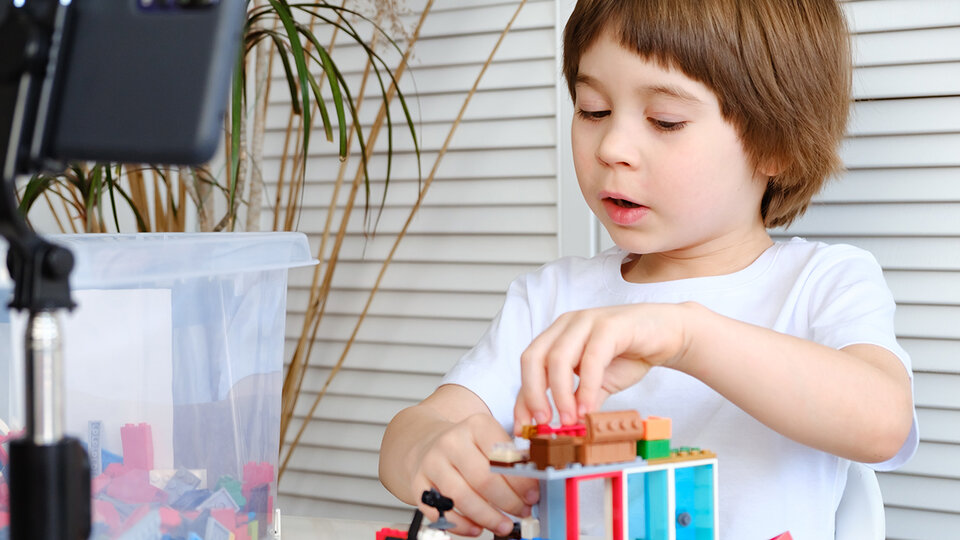 Kid playing with toys